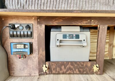 Electric cooler inside Kona camper van ready for island adventures