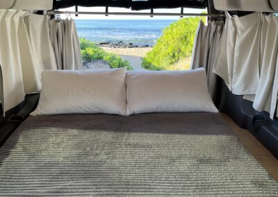 Carlos camper van with long bed setup for sleeping